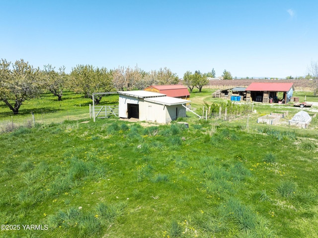 230 Krough Rd, Prosser, WA 99350 - view of yard with fence, a pole building, an outbuilding, and a rural view