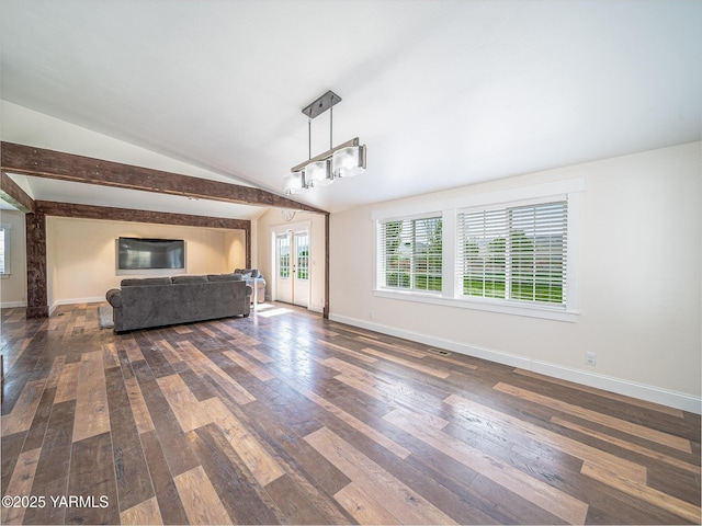 230 Krough Rd, Prosser, WA 99350 - unfurnished living room featuring wood-type flooring, baseboards, vaulted ceiling, and visible vents