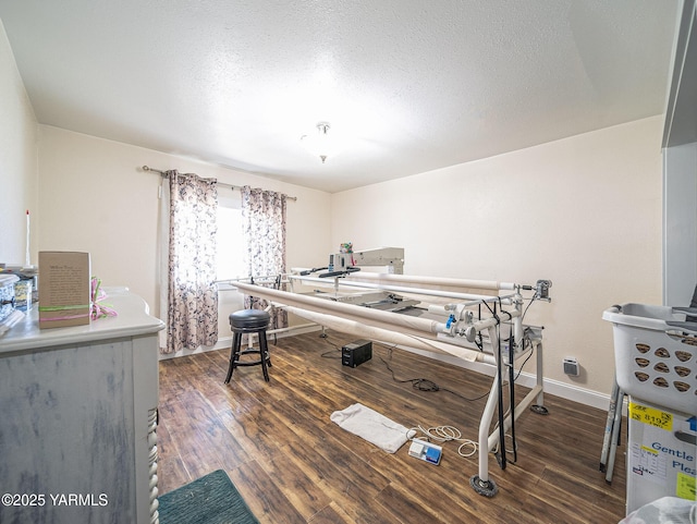 230 Krough Rd, Prosser, WA 99350 - bedroom with a textured ceiling, baseboards, and wood finished floors