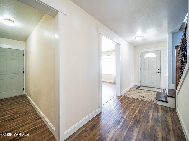 230 Krough Rd, Prosser, WA 99350 - entrance foyer with baseboards, a textured ceiling, and wood finished floors