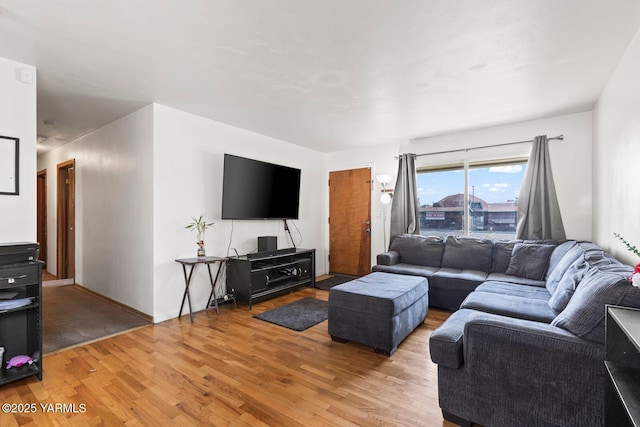 1306 S 6th Ave, Yakima, WA 98902 - living room featuring light wood-type flooring and baseboards
