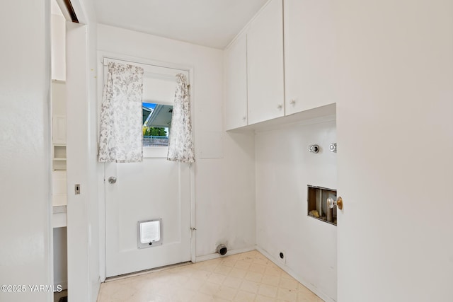 4905 Glenside Ct, Yakima, WA 98908 - clothes washing area with light floors, cabinet space, hookup for a washing machine, and electric dryer hookup
