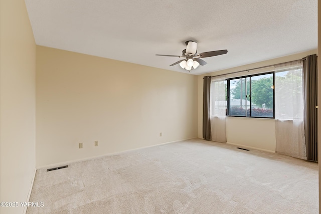 4905 Glenside Ct, Yakima, WA 98908 - unfurnished room featuring light colored carpet, ceiling fan, and baseboards