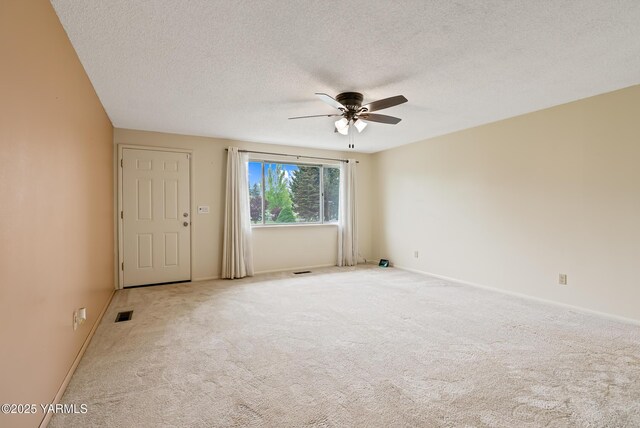 4905 Glenside Ct, Yakima, WA 98908 - carpeted empty room with a ceiling fan, a textured ceiling, and baseboards