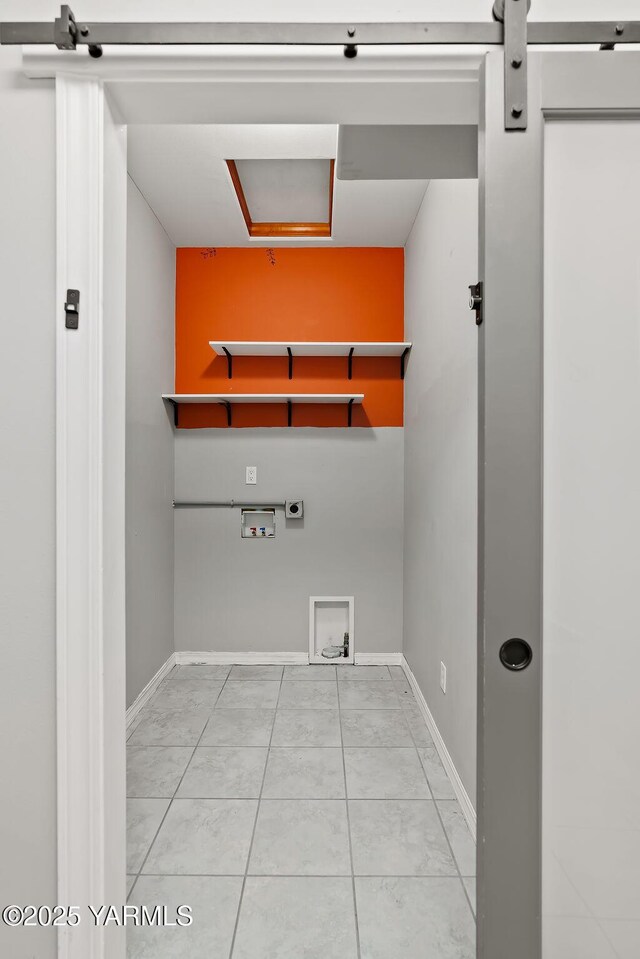 815 Trout Lake Ct, Yakima, WA 98901 - laundry room featuring washer hookup and light tile patterned floors