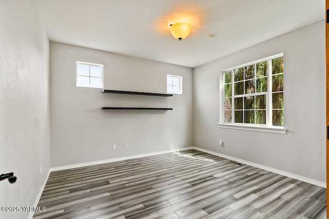 815 Trout Lake Ct, Yakima, WA 98901 - spare room with wood finished floors and healthy amount of natural light