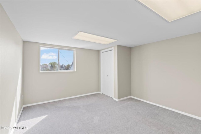 basement with carpet floors and baseboards