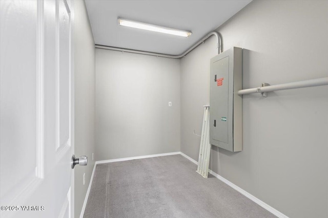 interior space with carpet flooring and baseboards
