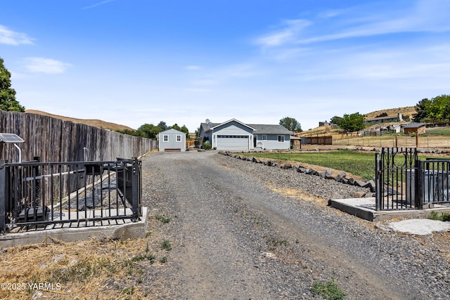 3485 Selah Loop Rd, Selah, WA 98942 - view of dirt / gravel road featuring a gated entry and a gate