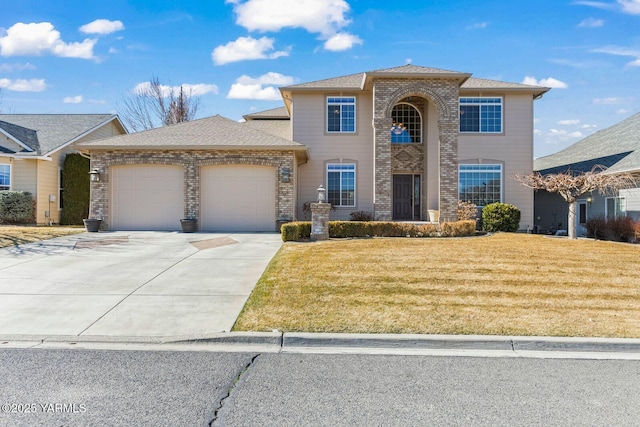 view of front of property featuring a garage, a front lawn, concrete driveway, and brick siding