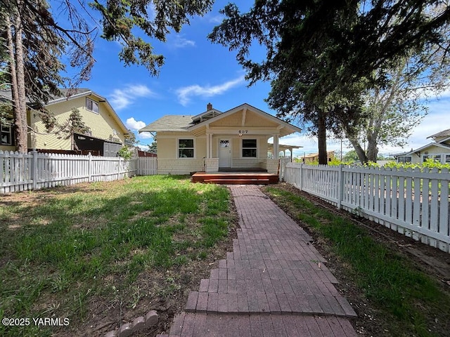 407 S 17th Ave, Yakima, WA 98902 - bungalow-style house featuring a chimney and a porch