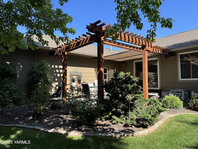 1013 Crest Acres Pl, Yakima, WA 98908 - rear view of house with a pergola and roof with shingles
