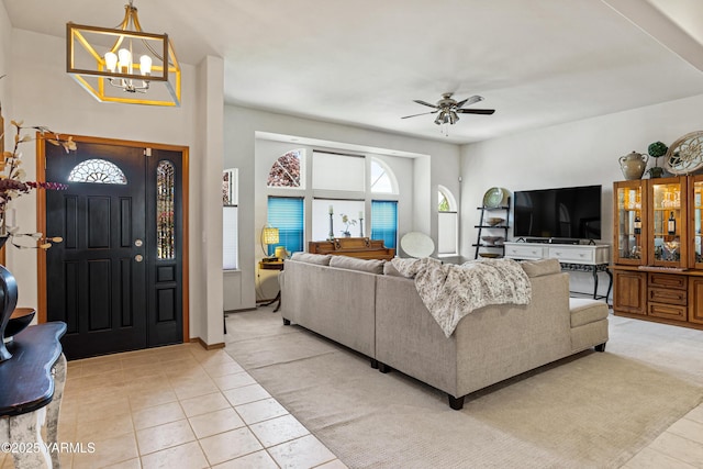 6 N 78th Ave, Yakima, WA 98908 - living room with a chandelier, ceiling fan, and light tile patterned flooring