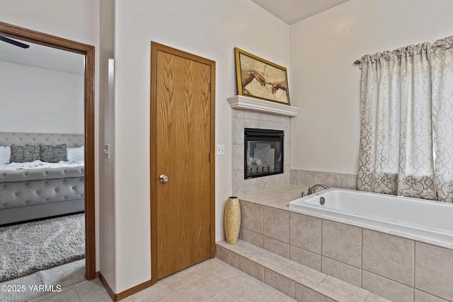6 N 78th Ave, Yakima, WA 98908 - bathroom with tile patterned flooring, a garden tub, and a fireplace