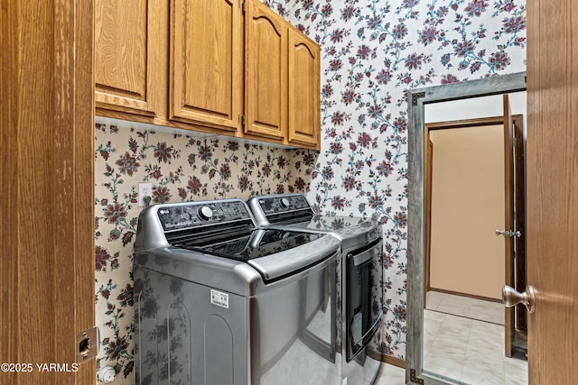 6 N 78th Ave, Yakima, WA 98908 - washroom featuring wallpapered walls, cabinet space, and washer and dryer