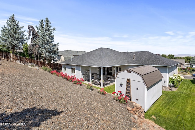 6 N 78th Ave, Yakima, WA 98908 - rear view of property featuring a storage unit and a patio area