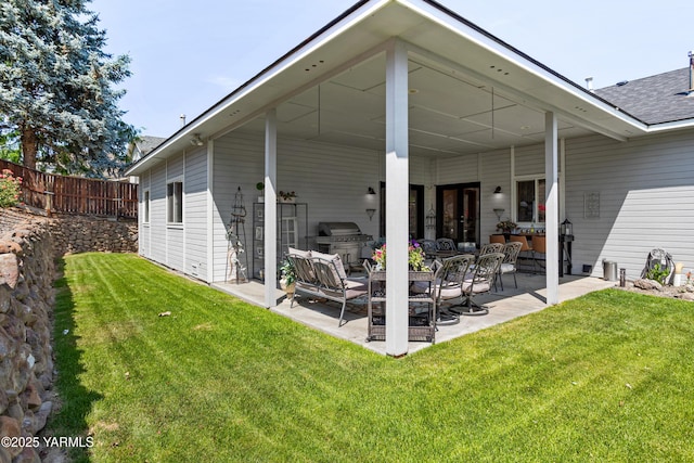 6 N 78th Ave, Yakima, WA 98908 - rear view of house featuring a patio area and roof with shingles
