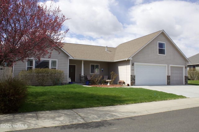 408 S 93rd Ave, Yakima, WA 98908 - view of front of home featuring an attached garage, roof with shingles, a front yard, and concrete driveway