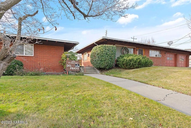 1501 W Chestnut Ave Unit 5, Yakima, WA 98902 - view of front of house featuring brick siding, a front lawn, cooling unit, and a garage