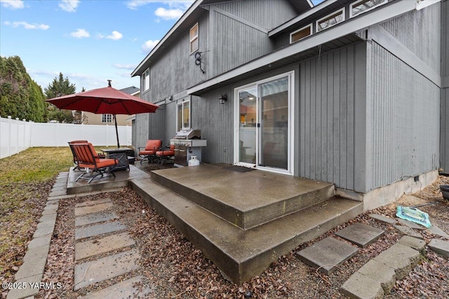 exterior space featuring area for grilling, fence private yard, and a patio area