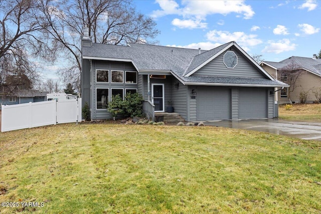 view of front of house with driveway, a shingled roof, fence, a front yard, and an attached garage