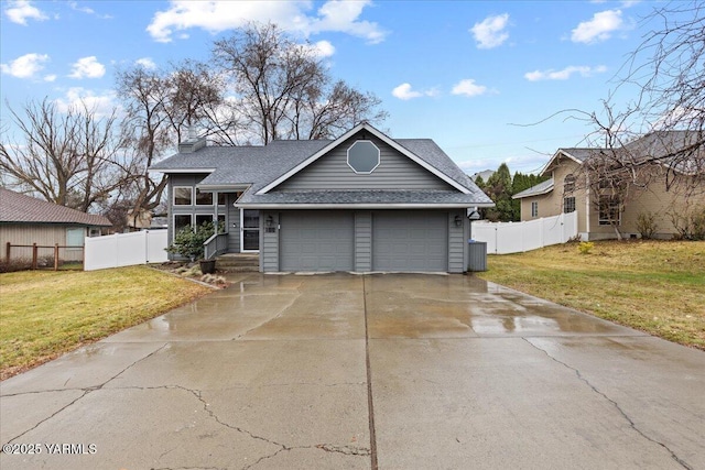 view of front of home with central AC unit, a front yard, and fence