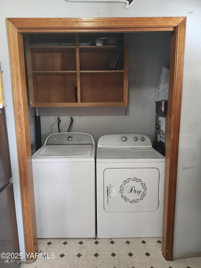 1202 W Viola Ave, Yakima, WA 98902 - laundry area with washer and dryer and tile patterned floors