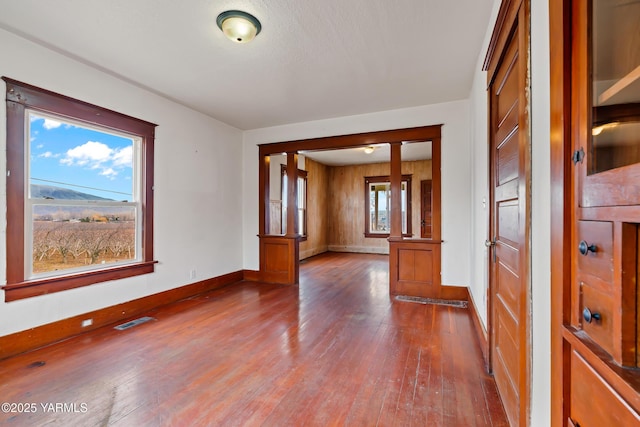 1555 W Tieton Rd, Tieton, WA 98947 - spare room featuring dark wood-style floors and baseboards