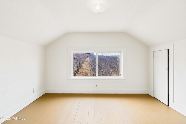 1555 W Tieton Rd, Tieton, WA 98947 - bonus room featuring lofted ceiling, baseboards, and light wood finished floors