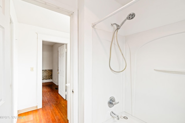 1555 W Tieton Rd, Tieton, WA 98947 - bathroom featuring wood finished floors and shower / bath combination