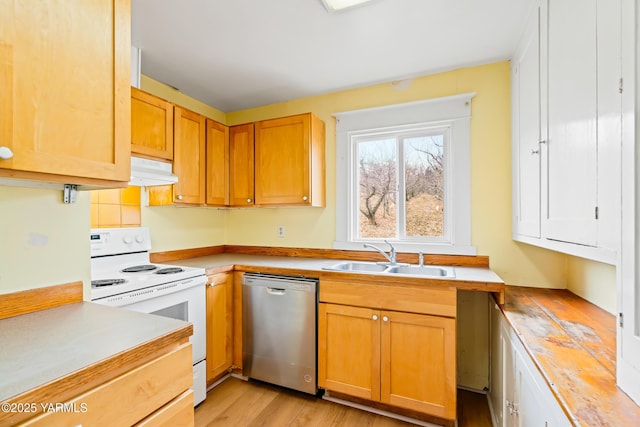 1555 W Tieton Rd, Tieton, WA 98947 - kitchen with stainless steel dishwasher, a sink, electric stove, light countertops, and under cabinet range hood