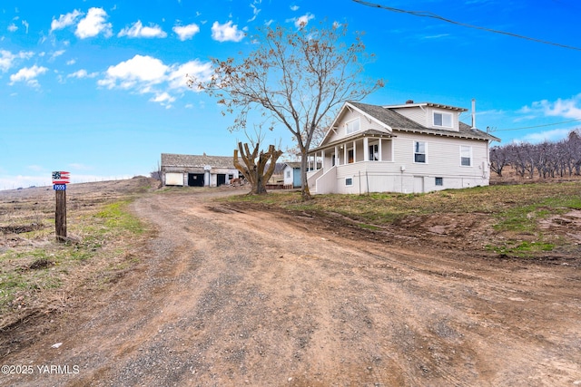 1555 W Tieton Rd, Tieton, WA 98947 - bungalow-style house with a porch and stairs