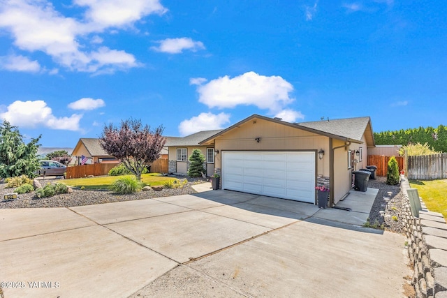602 N 57th Ave, Yakima, WA 98901 - ranch-style house with concrete driveway and a garage