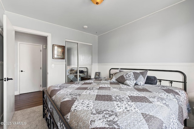 602 N 57th Ave, Yakima, WA 98901 - bedroom featuring a closet, a wainscoted wall, and carpet flooring
