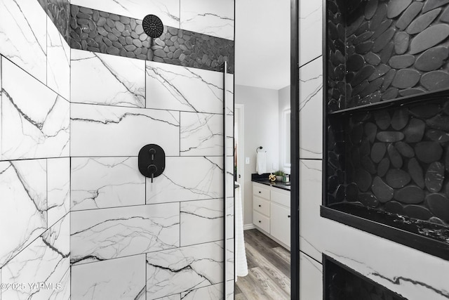 15014 Fisk Rd, Yakima, WA 98908 - full bathroom featuring a marble finish shower, vanity, and wood finished floors