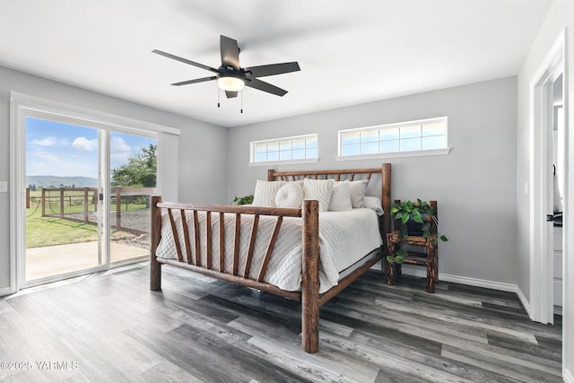 15014 Fisk Rd, Yakima, WA 98908 - bedroom with access to outside, wood finished floors, ceiling fan, and baseboards