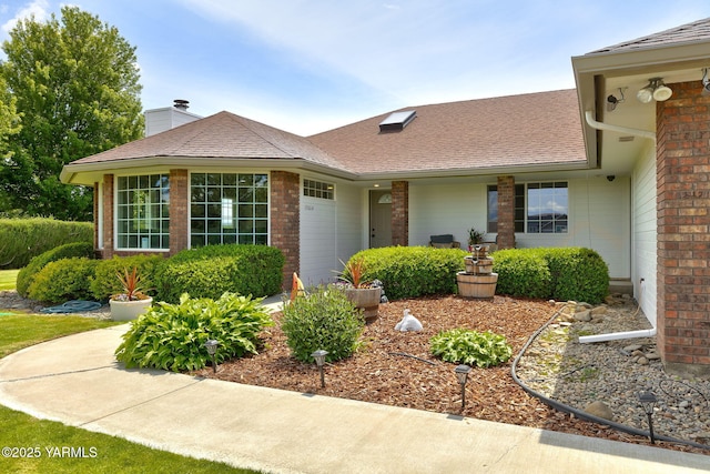 15014 Fisk Rd, Yakima, WA 98908 - entrance to property with a chimney and brick siding