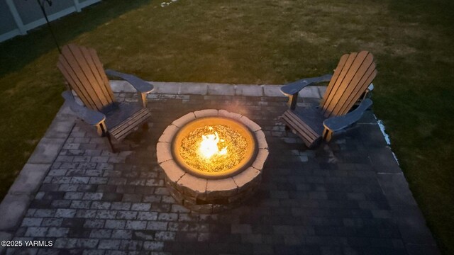 exterior space with an outdoor fire pit