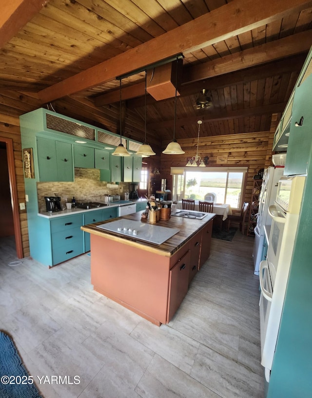 13520 Fisk Rd, Yakima, WA 98908 - kitchen with wood ceiling, healthy amount of natural light, a center island, green cabinets, and backsplash