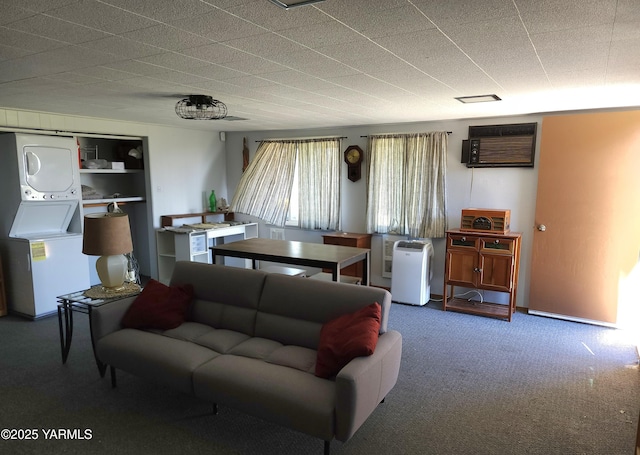 13520 Fisk Rd, Yakima, WA 98908 - carpeted living area with stacked washer / drying machine and a wall mounted air conditioner