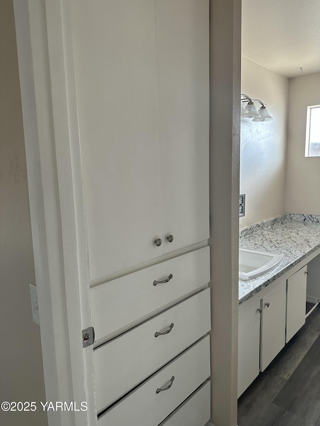205 N 63rd Ave, Yakima, WA 98908 - bathroom with vanity and wood finished floors