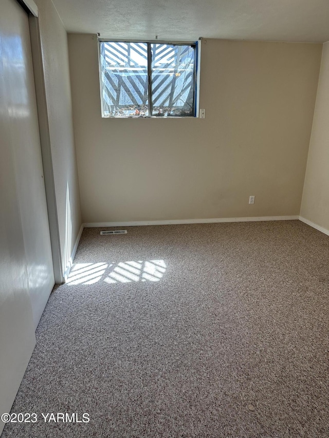 205 N 63rd Ave, Yakima, WA 98908 - spare room with carpet floors and baseboards