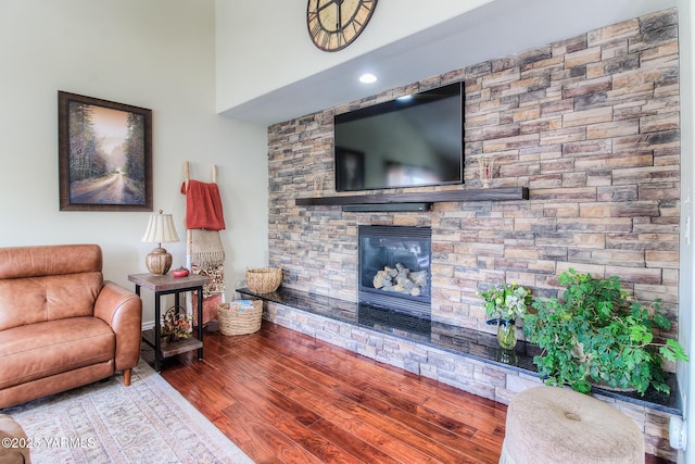 1008 S 90th Ave, Yakima, WA 98908 - living room with a stone fireplace and wood finished floors