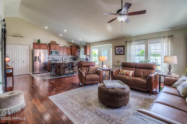 1008 S 90th Ave, Yakima, WA 98908 - living room with vaulted ceiling, hardwood / wood-style floors, a ceiling fan, recessed lighting, and plenty of natural light