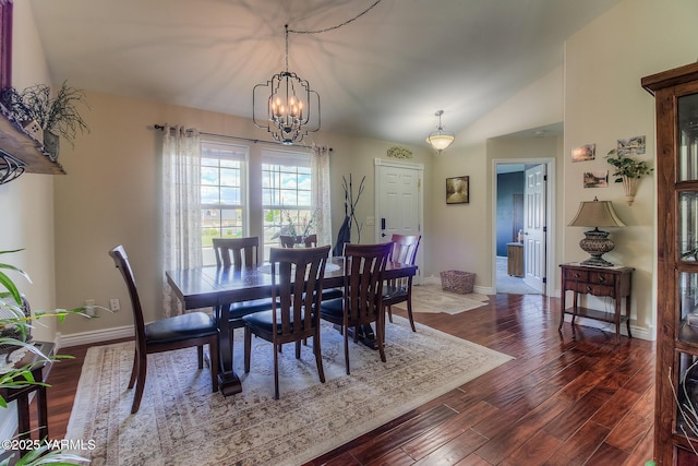 1008 S 90th Ave, Yakima, WA 98908 - dining room with dark wood-style floors, a chandelier, baseboards, and lofted ceiling
