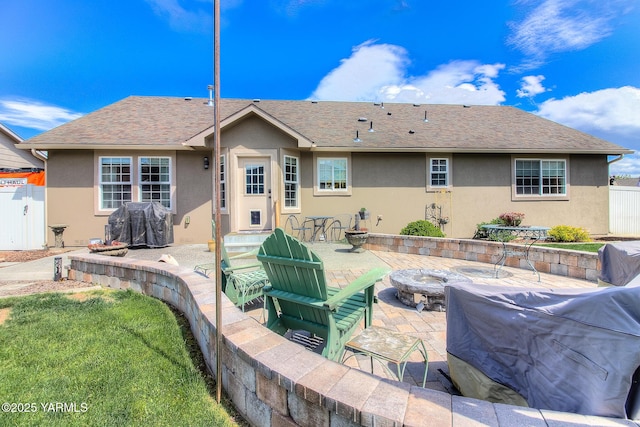 1008 S 90th Ave, Yakima, WA 98908 - back of house with stucco siding, a patio area, and a shingled roof