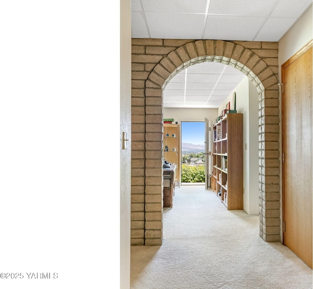 1011 N 42nd Pl, Yakima, WA 98908 - corridor featuring a paneled ceiling, arched walkways, and carpet floors