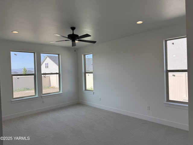 202 E Ian Ave, Ellensburg, WA 98926 - unfurnished room featuring light carpet, a ceiling fan, and recessed lighting