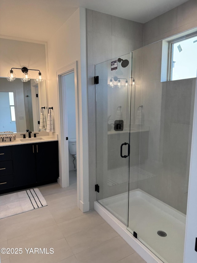 202 E Ian Ave, Ellensburg, WA 98926 - bathroom with a shower stall, vanity, and tile patterned floors