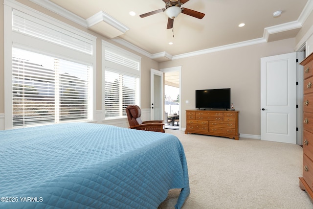 carpeted bedroom with crown molding, ceiling fan, recessed lighting, and a wainscoted wall